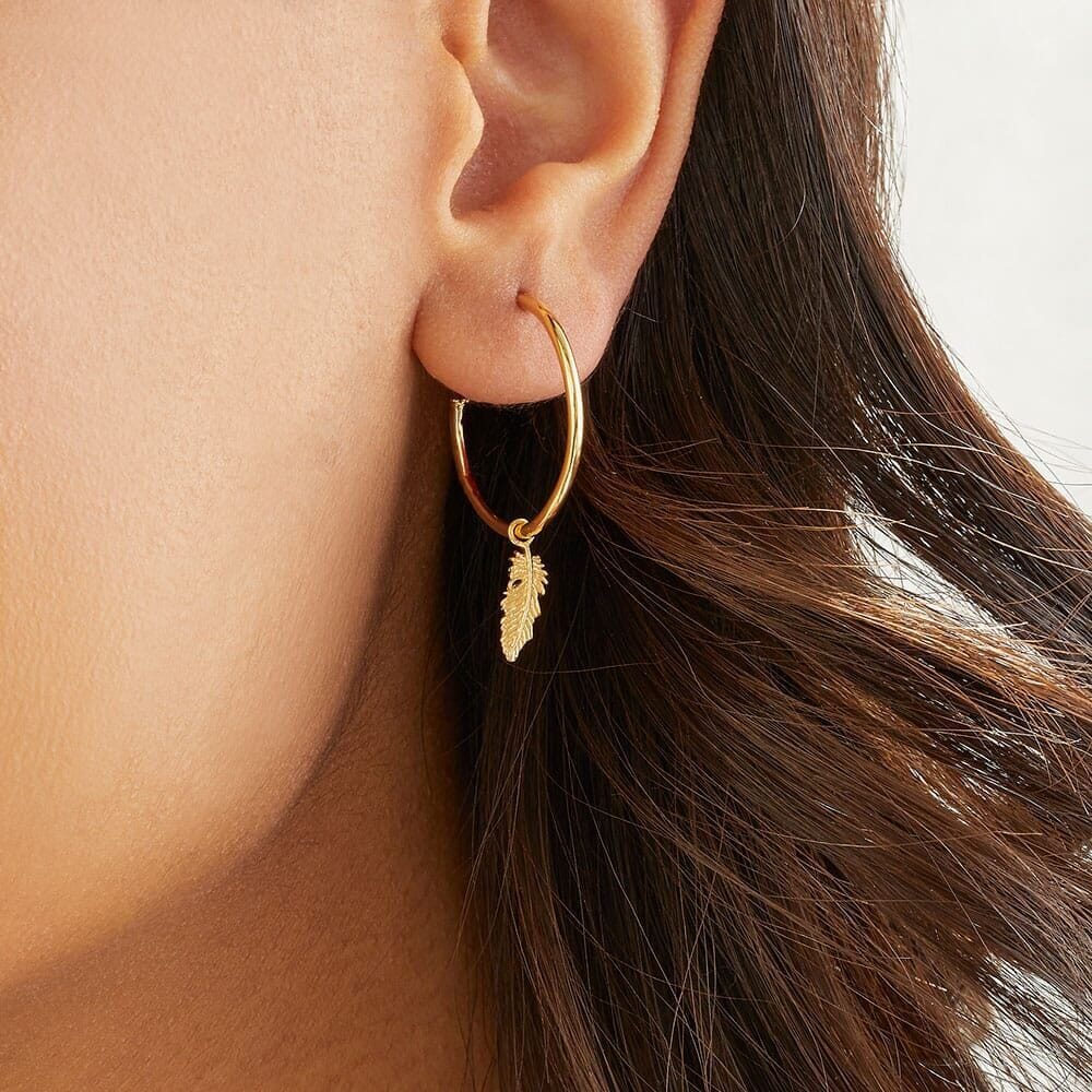 Gold feather deals hoop earrings