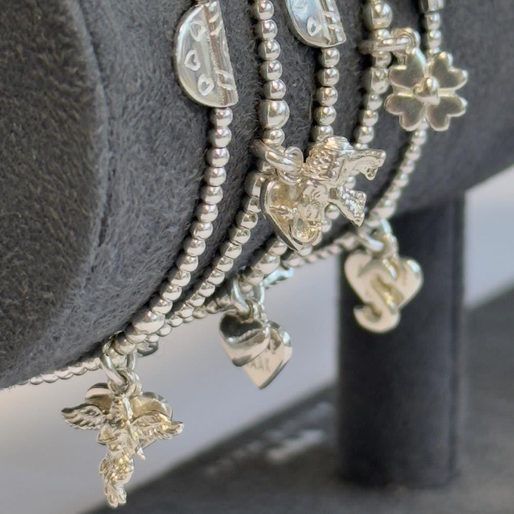 Lulu Silver Charm Bracelet - Four Heart Clover