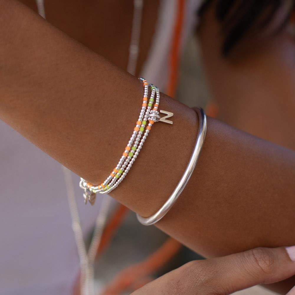 Piccolo Neon Orange Silver Charm Bracelet - Choice of initial
