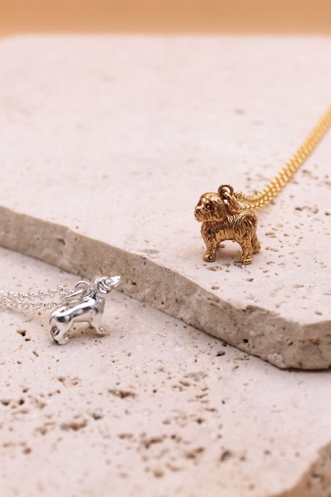 Introducing the Annie Haak 'In the Doghouse' Edit, a fun collection with paw and dog charms in a selection of breeds, on chain necklaces in 925 Sterling Silver and gold plated Silver.