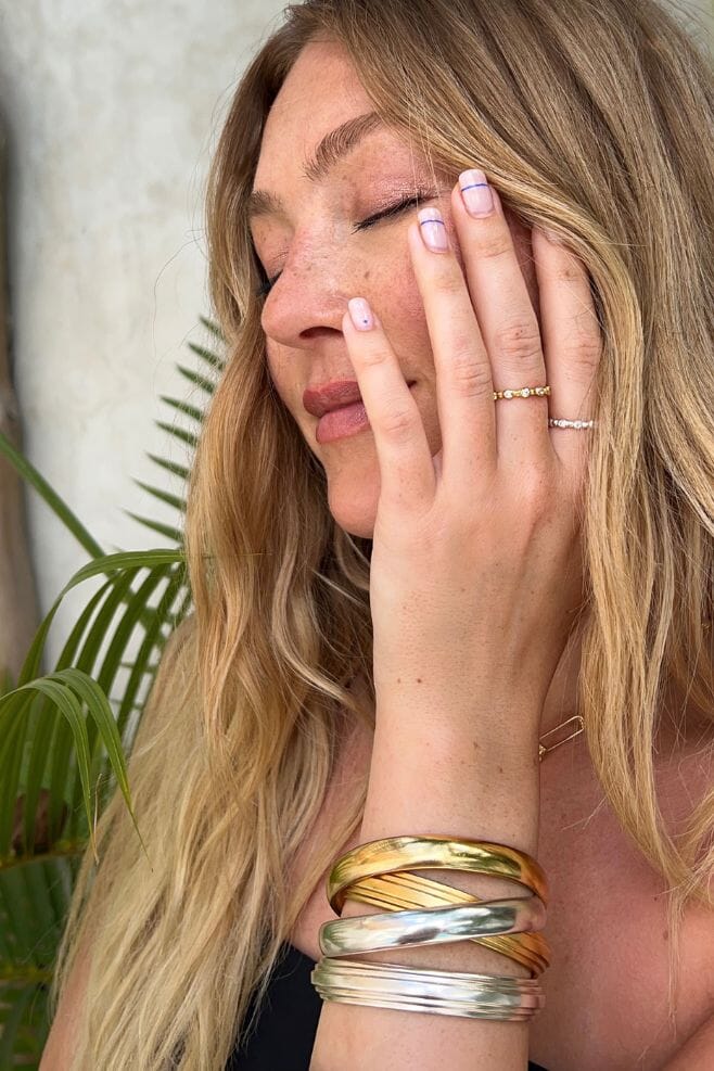 Featuring a bold curve, this bangle is perfect for stacking up with other bracelets from the NU&MII range.
