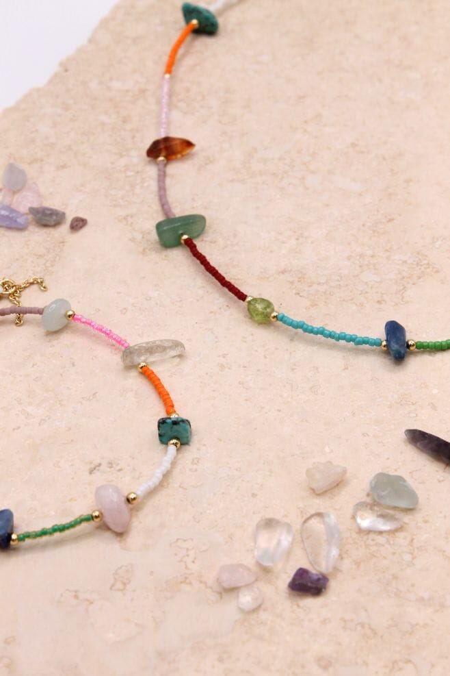 Threaded friendship-bracelet featuring a range of colourful semi-precious stones.