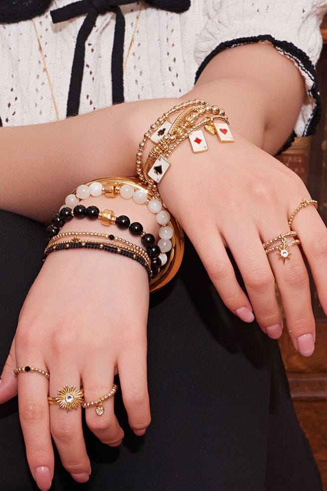 Four strand gold plated 925 Sterling Silver bracelet stack handcrafted in gold plated Silver and Italian enamel, featuring Ace playing card charms.