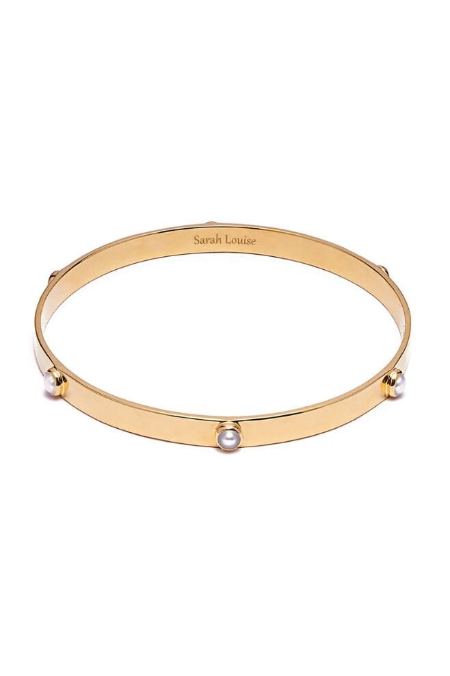 An elegant engraved bangle adorned with six Preciosa Pearls.