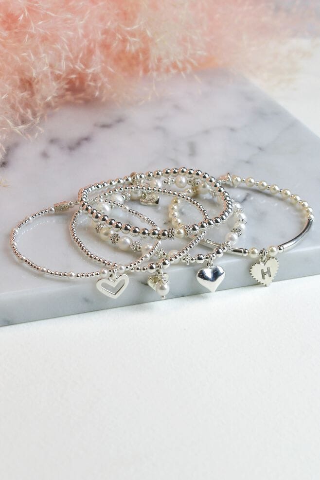 This five-strand stack features both Freshwater and Preciosa pearls.