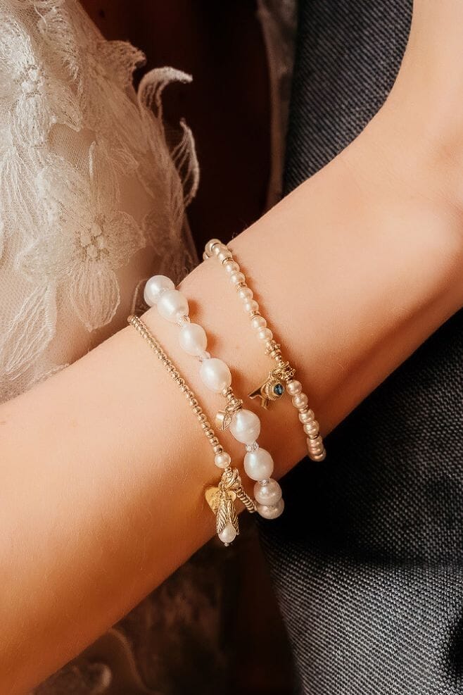 Elevate your bridal look and cherish your special day with this elegant and personalised three-strand bracelet stack.