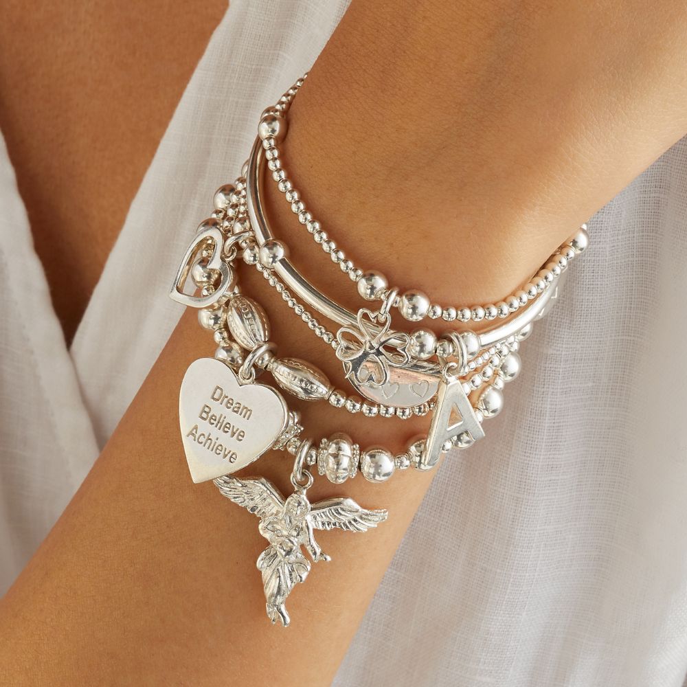 Featuring five bracelets in 925 Sterling Silver, each adorned with Annie Haak signature charms.
