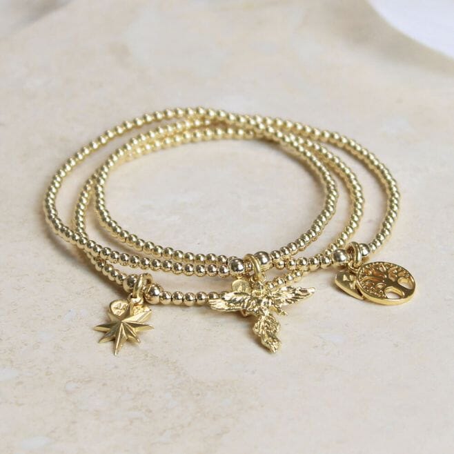 Three strand bracelet stack featuring 18ct gold plated 925 Sterling Silver and meaningful charms.