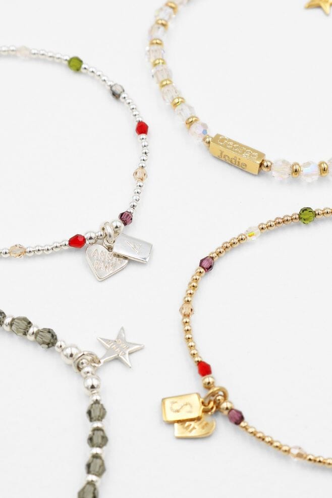 Sparkling jewellery collection featuring crystals, personalised engraving and initials.