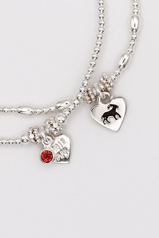Two-strand 925 Sterling Silver bracelet stack featuring your choice of birthstone and starsign charm.
