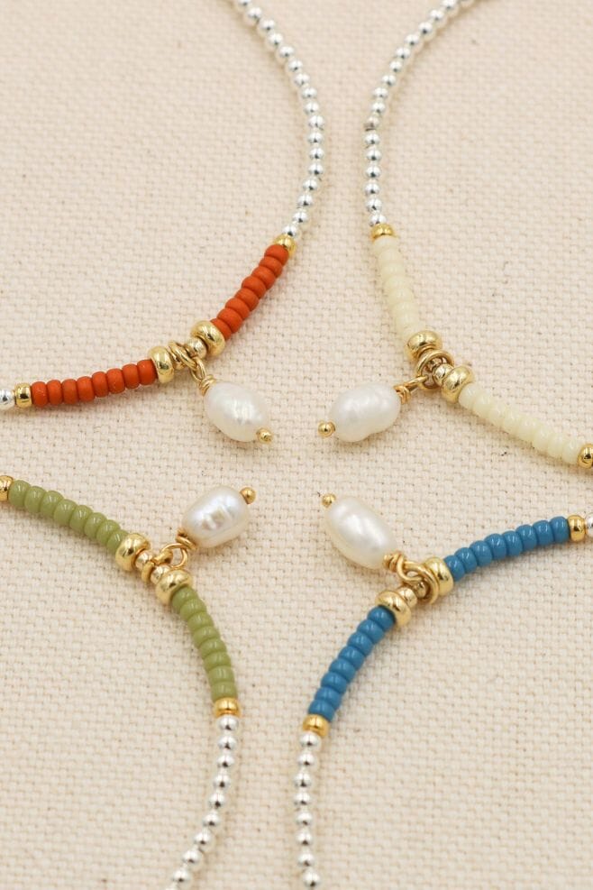 Stacking bracelet made with 925 Sterling Silver, gold-plated Silver, Japanese seed beads and a Freshwater pearl charm.