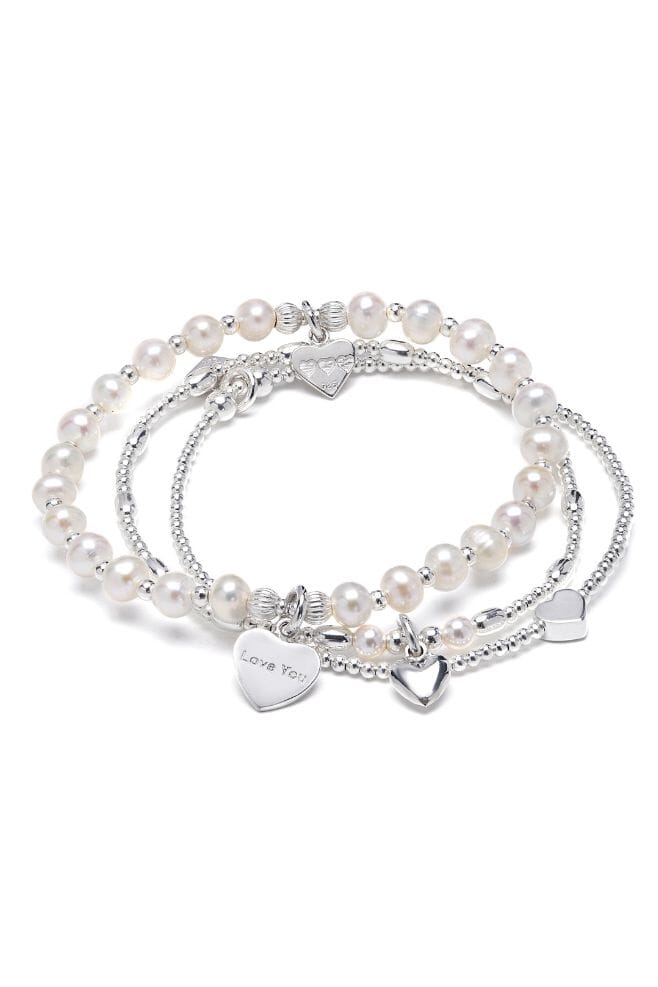Three strand bracelet stack featuring Grade AA Freshwater Pearls and 925 Sterling Silver beads.