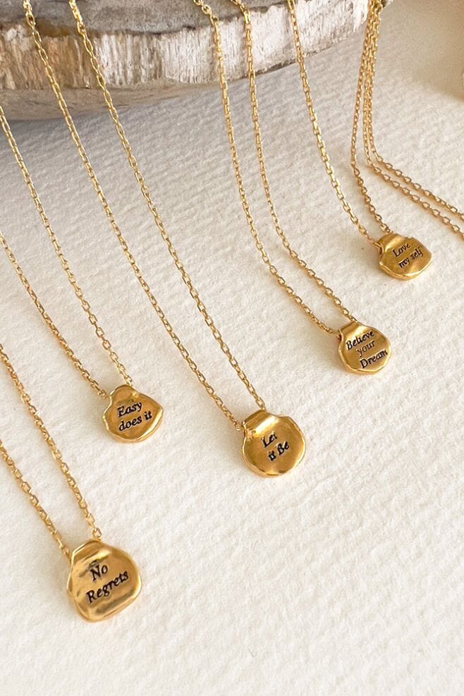 Elegant gold-plated 925 Sterling Silver pendant and chain featuring one of six positive affirmation charms.