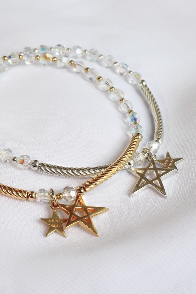 Made up of twisted 925 Sterling Silver tubes and Preciosa crystals, with a striking star charm; this gem of a bracelet will twinkle all night long.