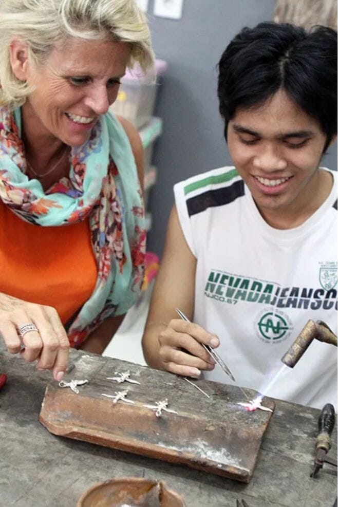 Annie working with local artisans.