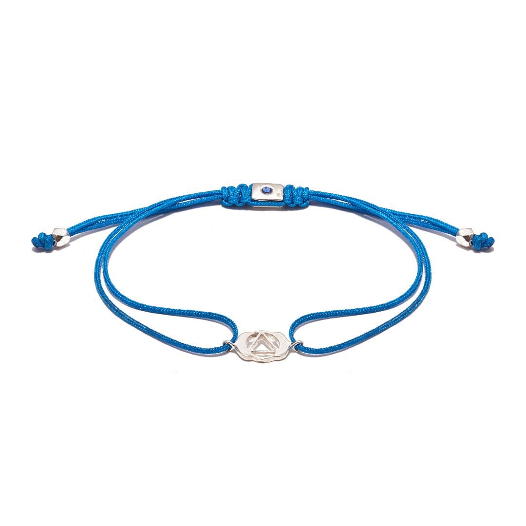 A meaningful Friendship bracelet featuring the Third Eye Chakra symbol, handcrafted in 925 Sterling Silver on dark blue adjustable cord.