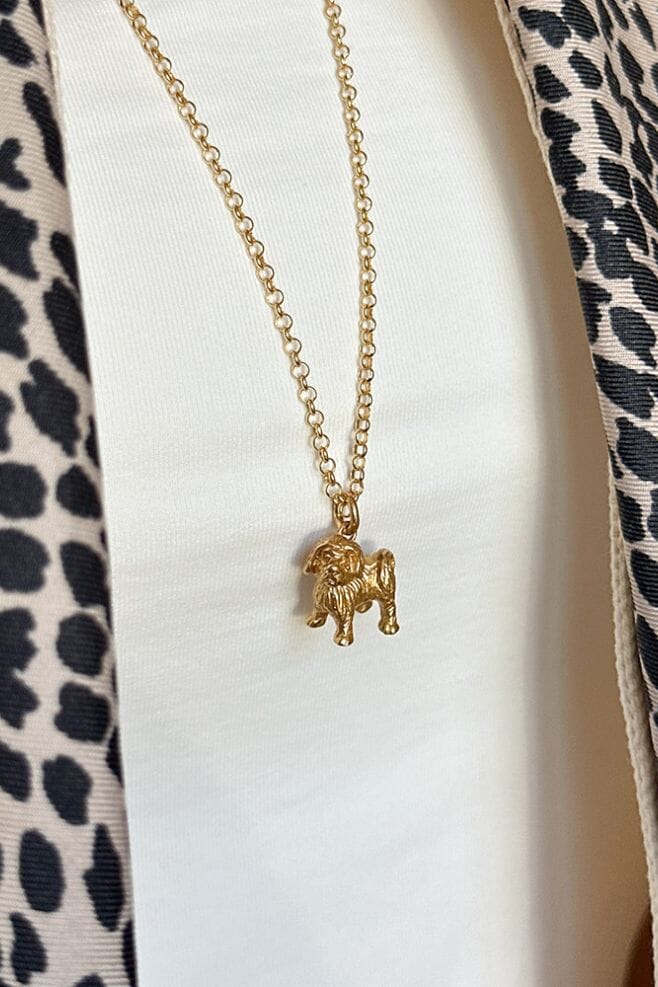 Hanging from a gold plated Silver long chain, this solid pendant necklace makes the perfect gift for a Malteze (or any dog!) lover. Intricately detailed and handmade in Bali.