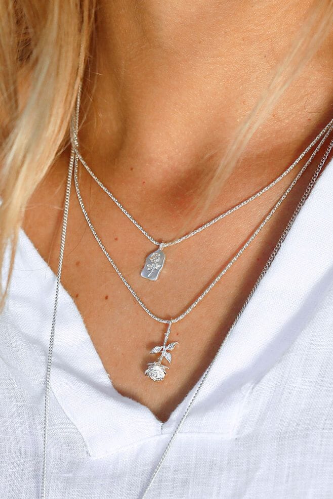 A unique 925 Sterling Silver Necklace with a Rose Stem charm.