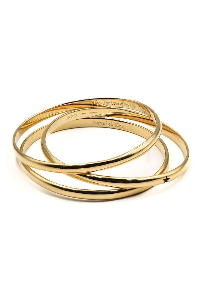 A sophisticated gold plated Sterling Silver bangle with an engraving of your choice.