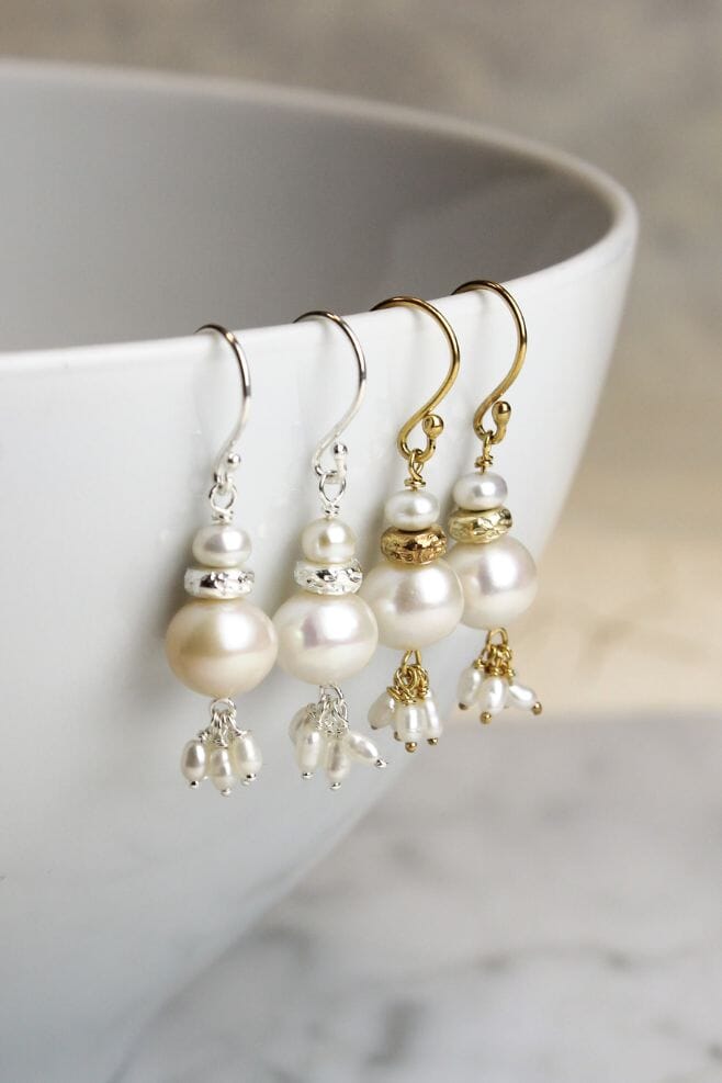 Gold plated Silver dangle earrings featuring Freshwater Pearls.