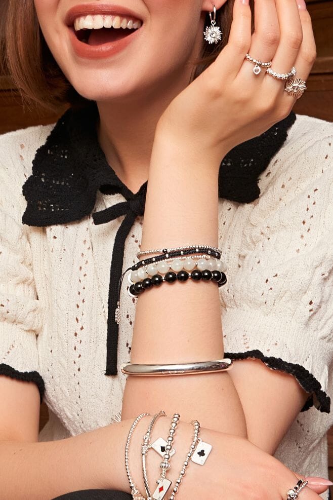This eye-catching stackable bracelet features genuine Black Tourmaline gemstone beads.