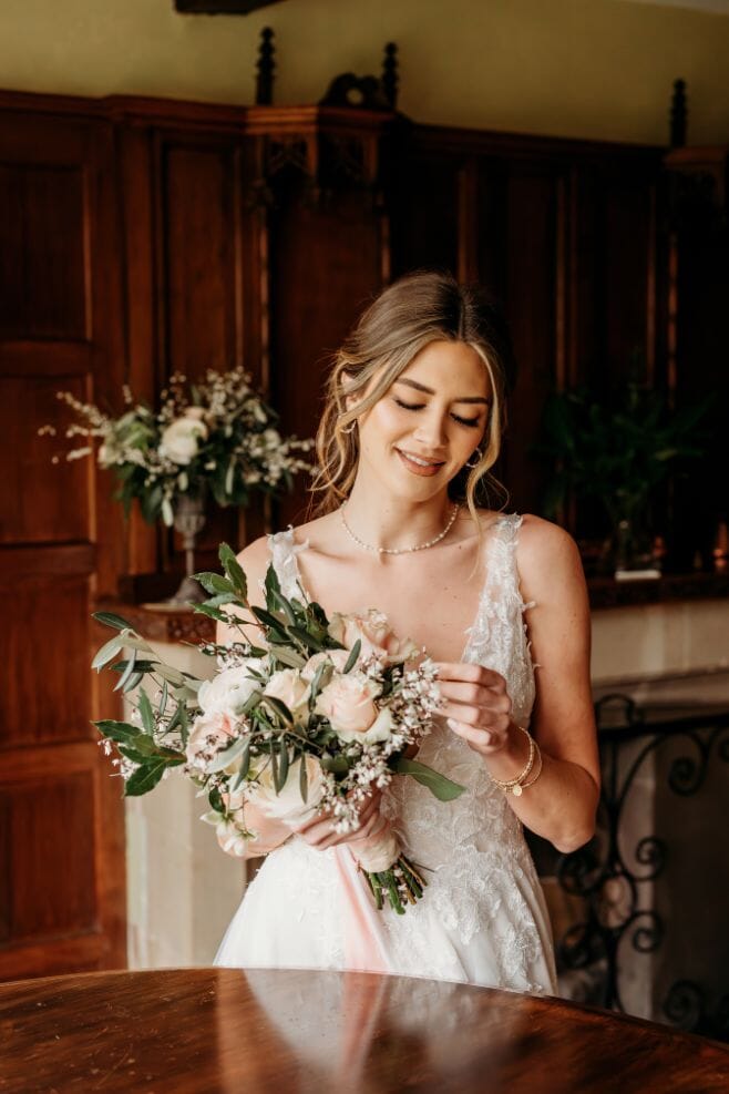One of our beautiful brides with her gorgeous bouquet.