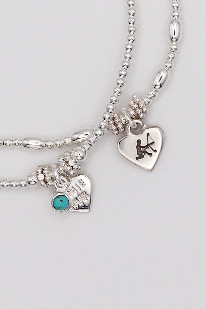 A 925 Sterling Silver two strand bracelet stack featuring the birth-sign and birth stone of your choice.