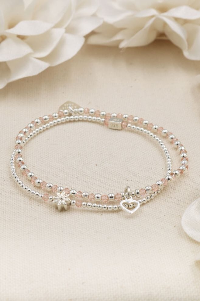 A two strand bracelet stack featuring 925 Sterling Silver and blush pink beads.