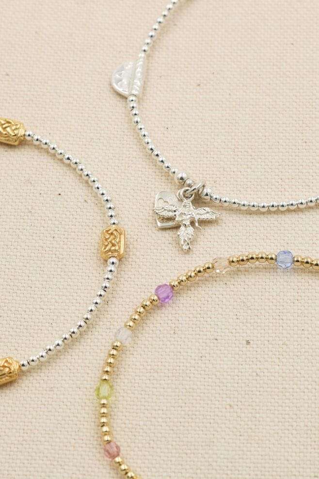 New mixed-metal stacking bracelet designs, handcrafted in 925 Sterling Silver.