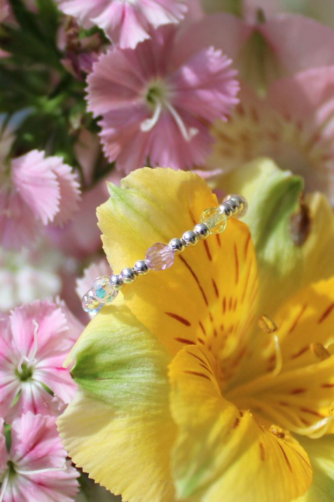 Handcrafted in 925 Sterling Silver beads and pastel coloured Preciosa crystals.