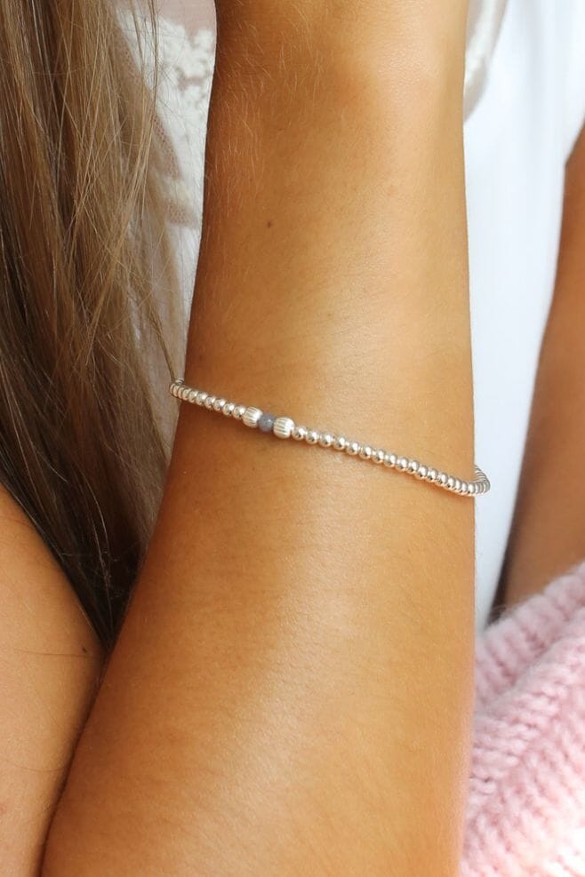 Add one of Annie’s stackable bracelets to your collection with the Milan Aster Bracelet, finished with a dazzling grey Agate semi-precious stone, daintily placed amongst 925 Sterling Silver beads.