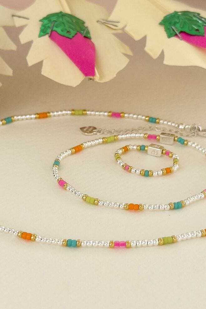 A fun summer jewellery set, featuring a mixed metal combination of 925 Sterling Silver and gold-plated beads, alongside colourful neon Japanese Seed beads.