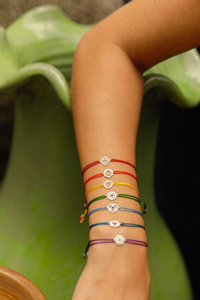 Feel empowered and confident whilst wearing the Chakra Friendship bracelet with a handcrafted 925 Sterling Silver Chakra Symbol.
