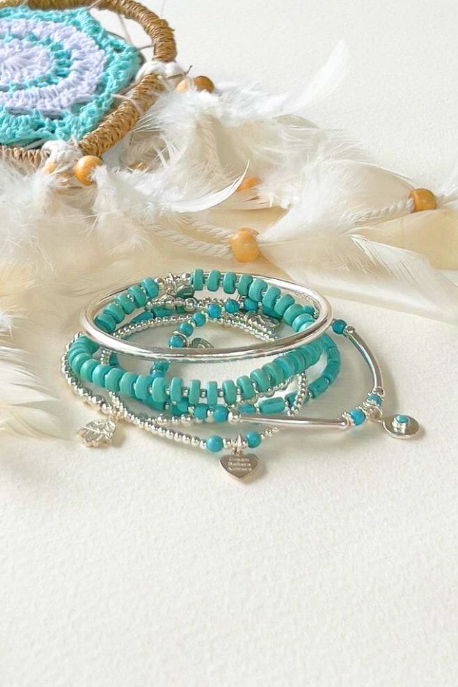 This chunky and eye-catching stack is made up of six brand new bracelets, one of which features the 925 Sterling Silver Fatima hand charm.
