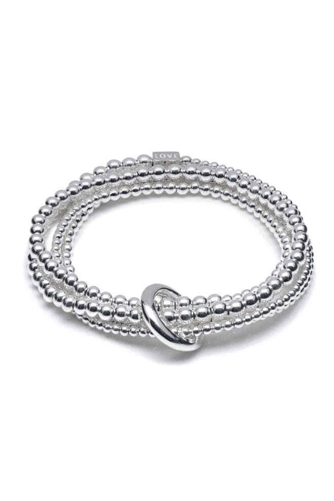 A 925 Sterling Silver wrap style bracelet featuring an unbroken yard of graduated beads held together with an iconic binding ring and finished off with an engraved Yard of Love bead.