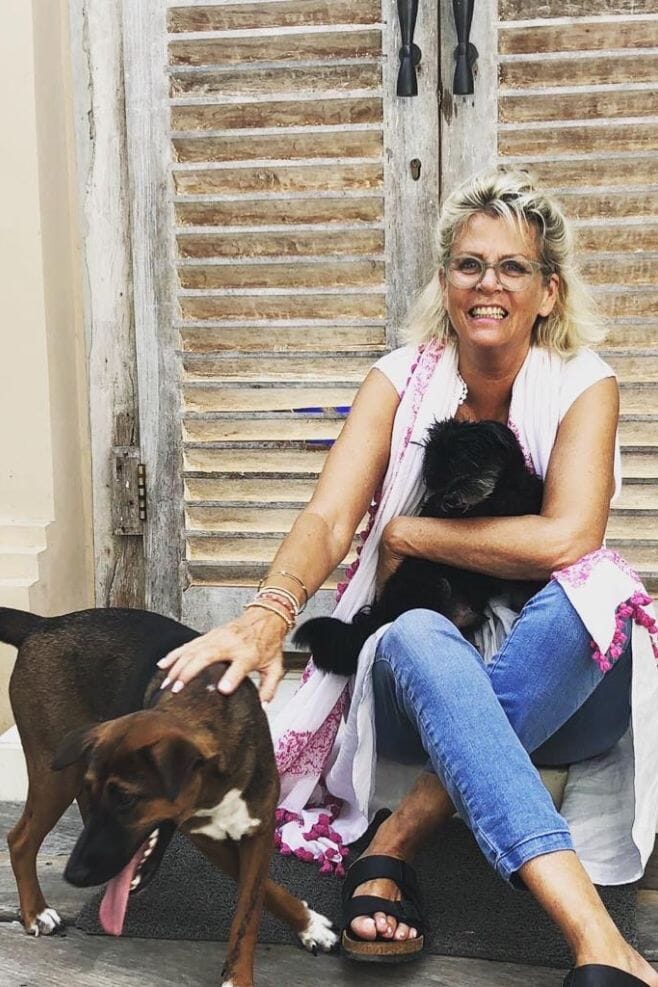 Annie spending time with her dogs in Bali.
