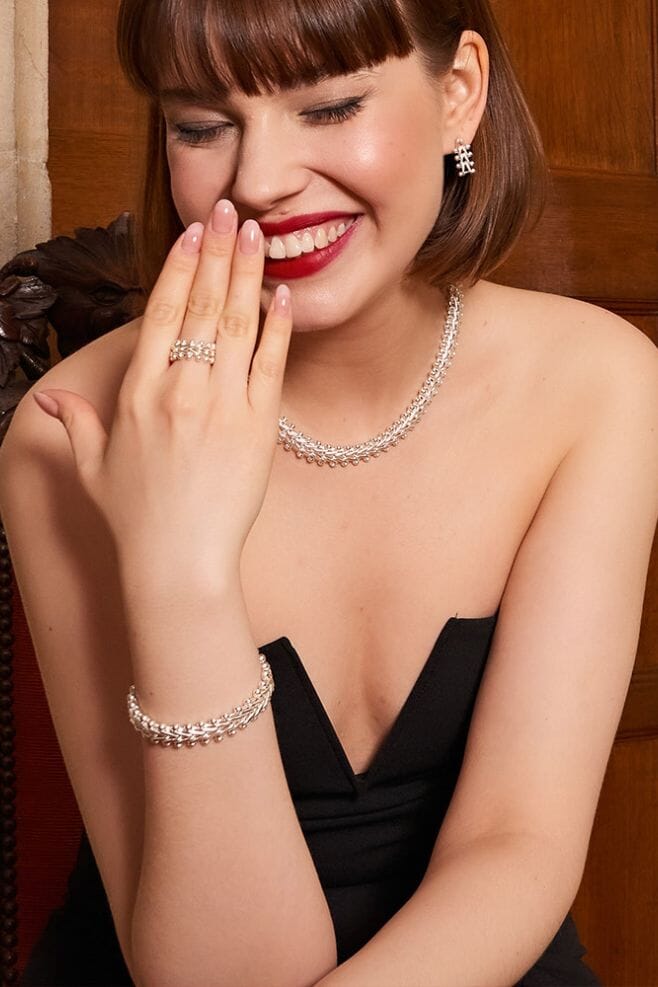 A 925 Sterling Silver statement design featuring an intricately handcrafted herringbone motif.