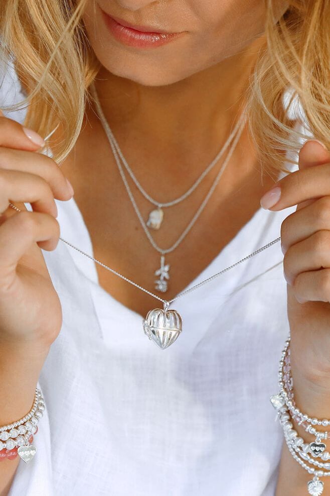 Each locket comes with your choice of Initial letter charm to keep close to your heart.
