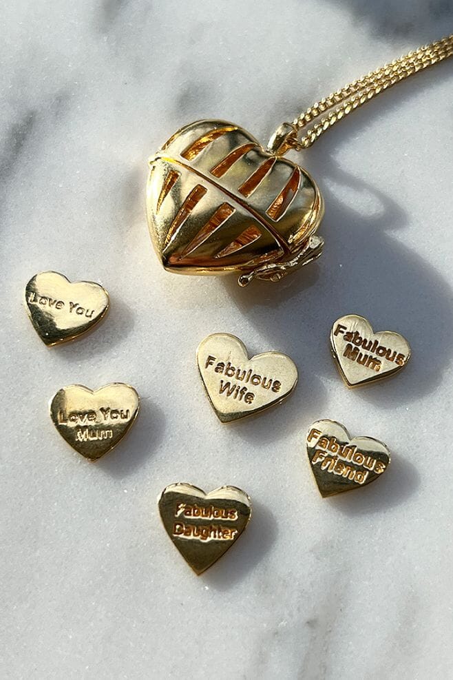 A Gold plated Silver keepsake Locket with your choice of engraved Motto Heart.