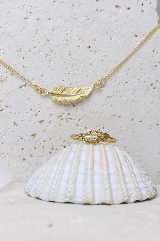A meaningful gold-plated silver feather motif solid ring.