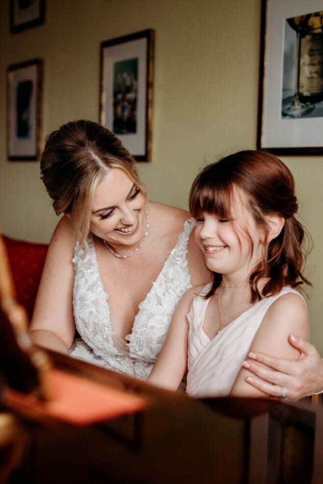 A special moment between the bride and flowergirl.
