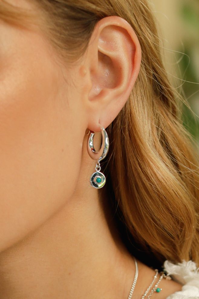 925 Sterling Silver chunky hoop earrings, with a turquoise Magnesite stone embedded within a circle charm.