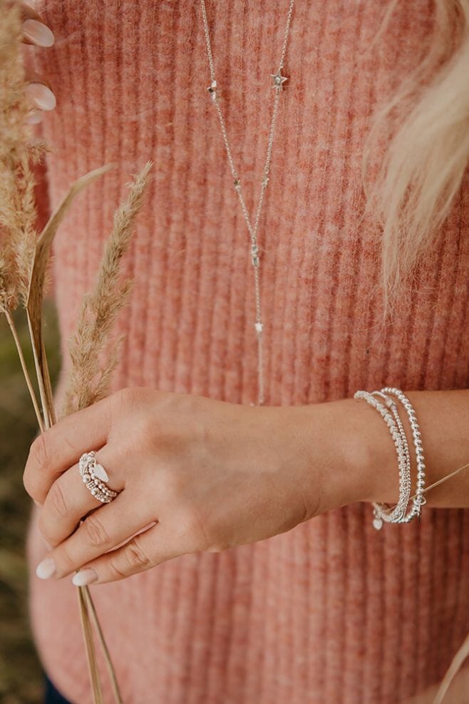 A trio of stylish and stackable Sterling Silver bracelets, featuring genuine sparkling Preciosa Crystals and a pretty Heart Crystal charm.