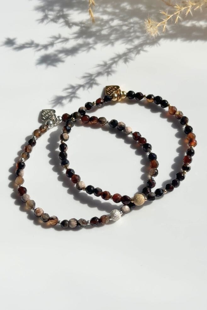 An autumnal design featuring a sparkly Stardust charm and Mottled Jasper that is considered a powerful healing stone that gives a sense of well-being.
