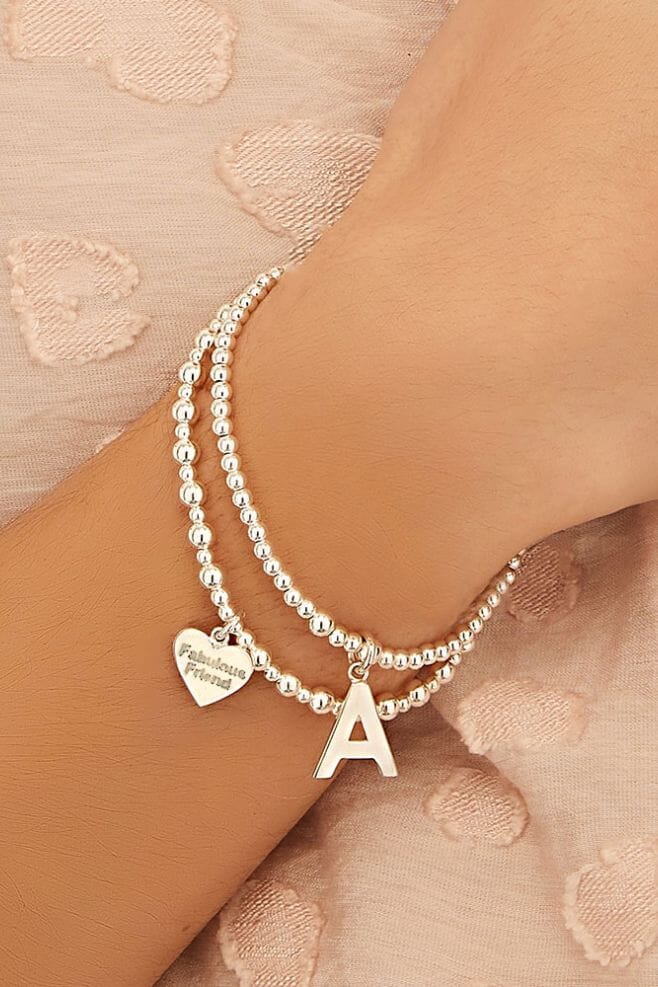 This 925 Sterling Silver stackable bracelet has an engraved Fabulous Friend charm for a personal touch.