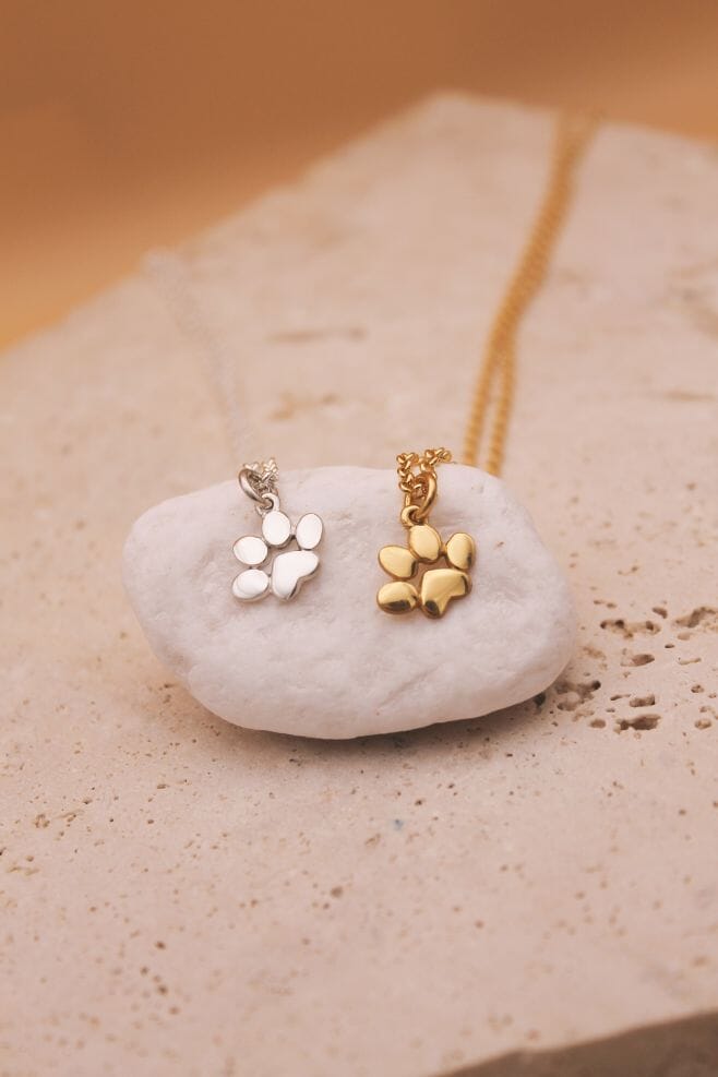 Hanging from a gold plated Silver long chain, this pendant necklace makes the perfect gift for any dog lover. Intricately detailed and handmade in Bali.