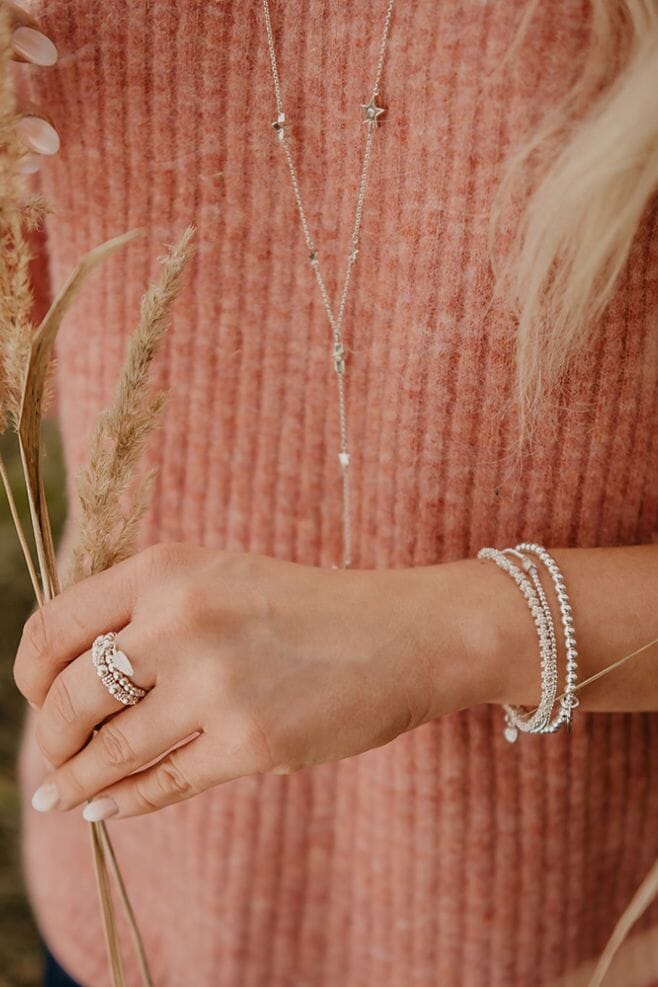 A trio of stylish and stackable Sterling Silver bracelets, featuring genuine sparkling Preciosa Crystals and a pretty Heart Crystal charm.