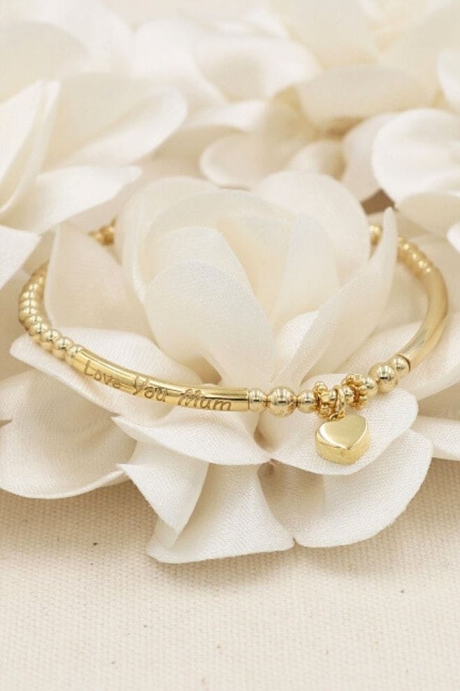 An eclectic design of gold plated beads with a heartfelt engraving, ‘Love You Mum’.