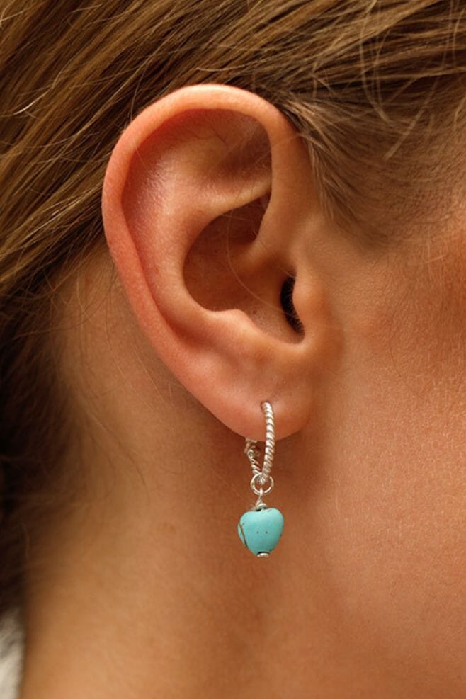 925 Sterling Silver twisted hoop earrings, lovingly handcrafted with a turquoise Magnesite heart shaped charm.