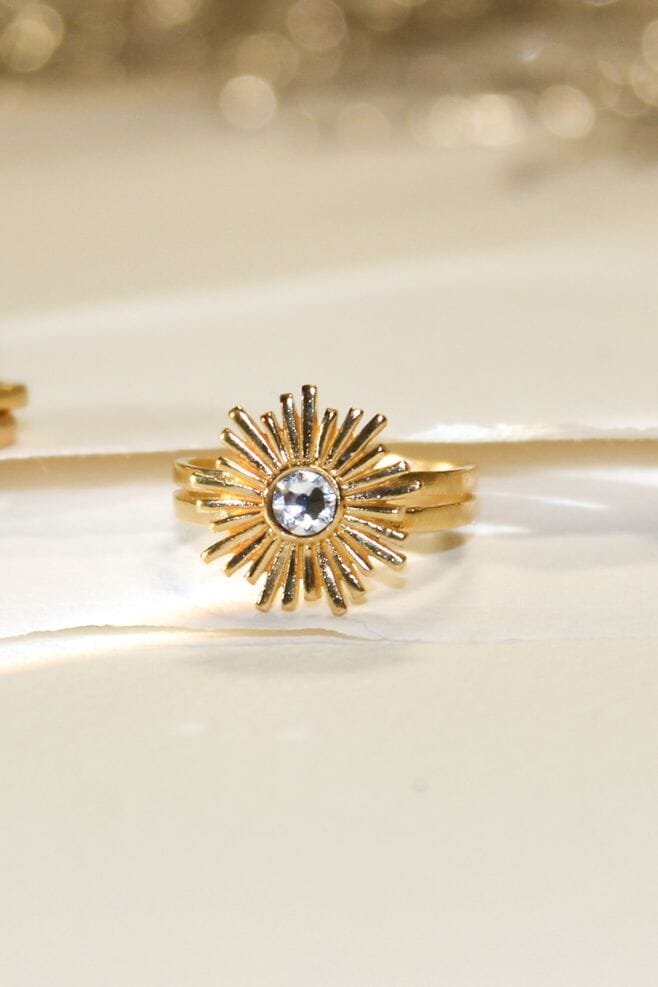 This new favourite features an intricately designed gold plated Sterling Silver starburst detail with a sparkling crystal centrepiece.